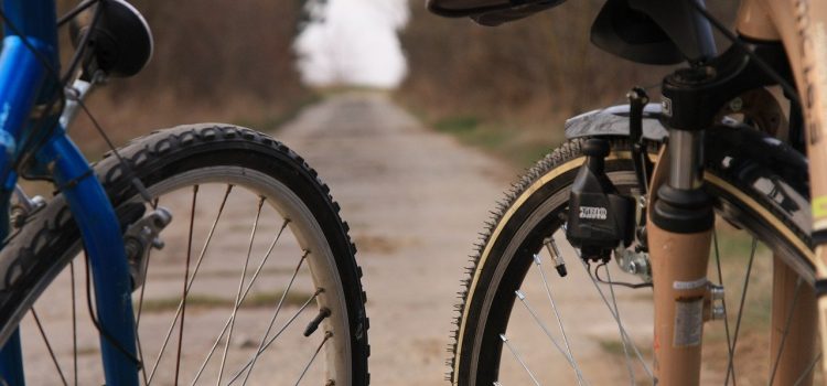 How do I inflate the wheel on my bicycle?