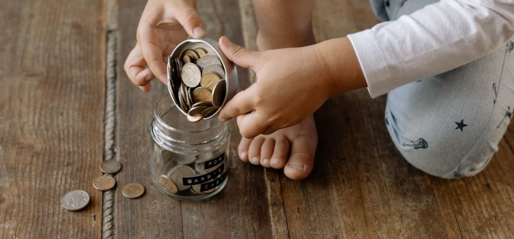 How do you teach your toddler to save money?