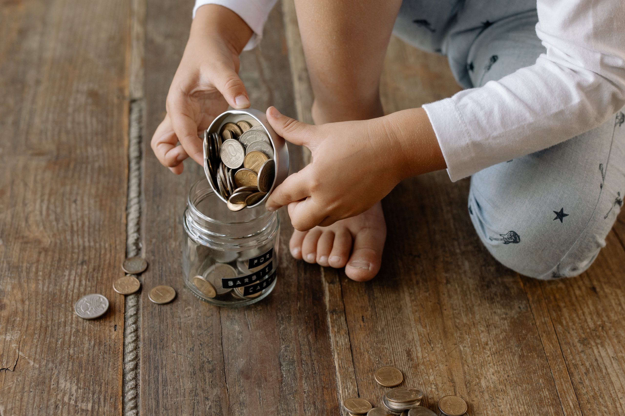 How do you teach your toddler to save money?
