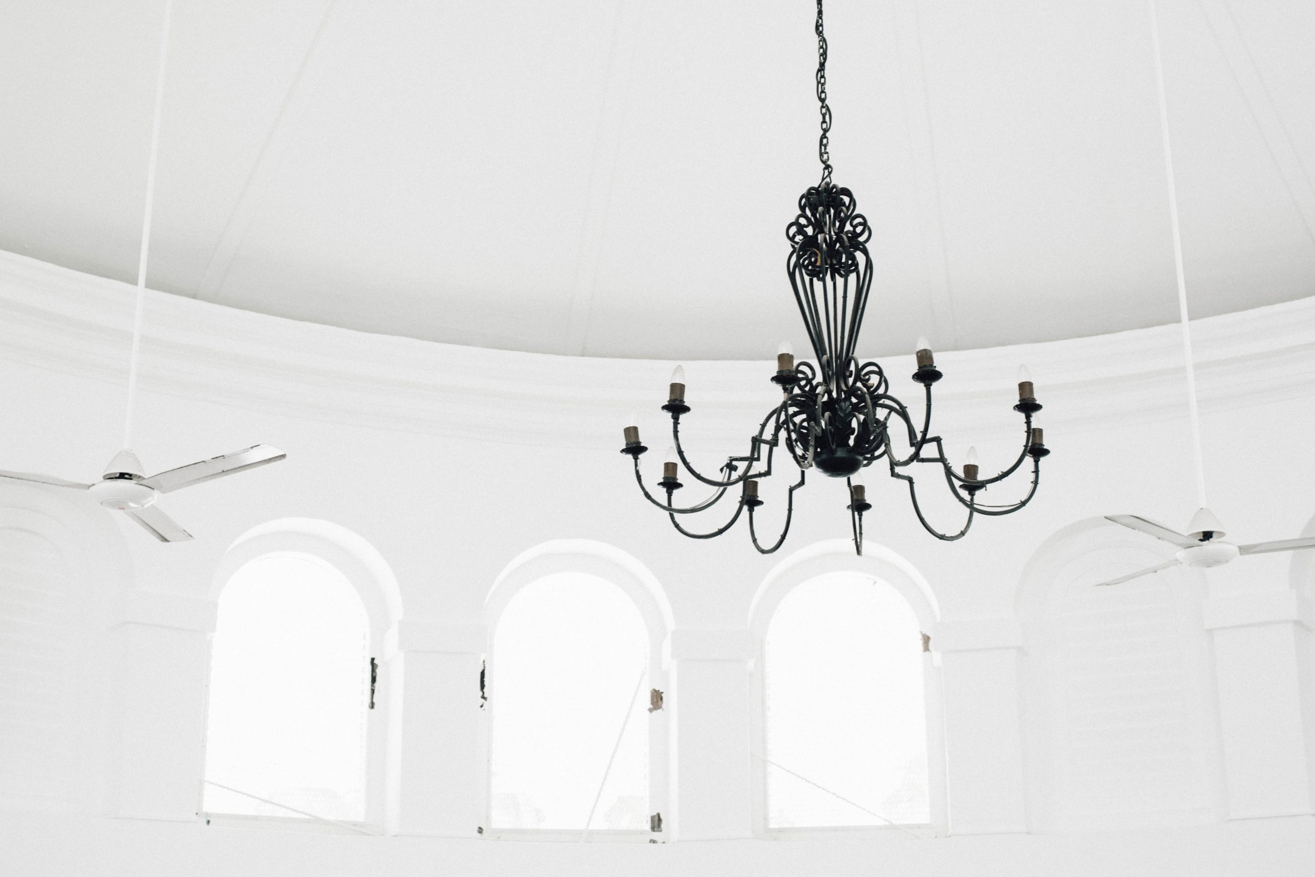 What interiors do chandeliers fit into?